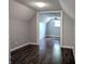 This bonus room includes hardwood floors, neutral walls and natural light at 1637 Meridian St, Columbus, IN 47201
