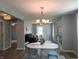 Open floor plan connecting dining and living room filled with natural light and modern accents at 1637 Meridian St, Columbus, IN 47201
