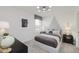 Stylish bedroom features natural light, neutral tones, and modern decor at 16465 Mount Logan Rd, Noblesville, IN 46060