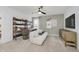 Comfortable bedroom setup with stylish décor, modern furniture, a ceiling fan, and a television at 16465 Mount Logan Rd, Noblesville, IN 46060
