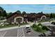 A rendering shows the beautiful exterior of the community clubhouse with lush landscaping at 16465 Mount Logan Rd, Noblesville, IN 46060