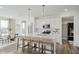 Bright kitchen with a large island, pendant lighting, stainless steel appliances, and modern style at 16465 Mount Logan Rd, Noblesville, IN 46060