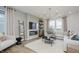 Stylish living room showcasing a cozy seating area, fireplace, and modern decor at 16465 Mount Logan Rd, Noblesville, IN 46060