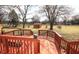 Wide backyard view from a large wooden deck showcasing expansive green space at 1739 Forest Dr, Indianapolis, IN 46227