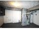 Utility area showing HVAC and hot water heater at 1739 Forest Dr, Indianapolis, IN 46227