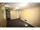 Spacious basement featuring paneled walls, carpeted flooring and recessed lighting at 1739 Forest Dr, Indianapolis, IN 46227