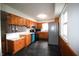 Spacious bedroom with gleaming hardwood floors and ensuite bathroom access at 1739 Forest Dr, Indianapolis, IN 46227