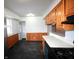 View of the kitchen showcasing the transition to the breakfast nook and access to other rooms at 1739 Forest Dr, Indianapolis, IN 46227