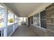 Inviting covered porch offers a seamless transition from the outdoors to the charming interior at 1739 Forest Dr, Indianapolis, IN 46227