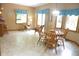 Bright breakfast nook with tile flooring and a lot of natural light from the many windows at 1739 S County Road 450 E, Avon, IN 46123