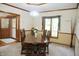 Formal dining room with a wooden table and chairs, chandelier, and natural light at 1739 S County Road 450 E, Avon, IN 46123