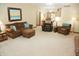 Cozy living room with carpet and comfortable seating arrangement; perfect for relaxation at 1739 S County Road 450 E, Avon, IN 46123