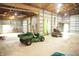 Spacious garage interior with vehicle, tools, and ample storage at 1739 S County Road 450 E, Avon, IN 46123