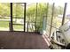 Spacious screened porch with tranquil views of the yard and lake at 1739 S County Road 450 E, Avon, IN 46123