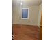 Simple room with hardwood flooring and natural light at 196 Bakemeyer St, Indianapolis, IN 46225