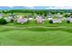 Aerial shot featuring homes in a golf course community on a bright, sunny day at 217 Saint Andrews Ave, Edinburgh, IN 46124
