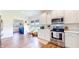 Well-lit kitchen featuring white cabinets, stainless steel appliances, and an open layout for cooking and entertaining at 217 Saint Andrews Ave, Edinburgh, IN 46124