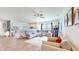 Bright and airy living room with open floor plan, flowing into the kitchen and dining area at 217 Saint Andrews Ave, Edinburgh, IN 46124