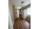 Practical kitchen layout, featuring clean lines, laminate floors, and natural light from the window at 2180 N Irwin St, Indianapolis, IN 46219