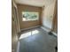 Useful mudroom with access to the exterior, featuring tiled flooring, and a backyard view at 2180 N Irwin St, Indianapolis, IN 46219