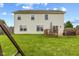 Spacious backyard featuring a wooden deck, great for entertaining and enjoying outdoor living at 2580 Bluewood Way, Plainfield, IN 46168