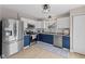 Stylish kitchen featuring white cabinets and stainless steel appliances and hardwood floors at 2580 Bluewood Way, Plainfield, IN 46168