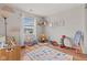 Fun playroom filled with toys, a rug with letters, and natural light coming through the window at 2580 Bluewood Way, Plainfield, IN 46168