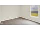 Simple bedroom with neutral carpeting and a bright window providing natural light at 2733 Bo W St, Plainfield, IN 46168