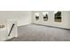 Large bonus room with neutral carpeting, many windows and natural light at 2733 Bo W St, Plainfield, IN 46168