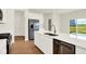 Contemporary kitchen with an island, stainless steel appliances, and an adjacent patio at 2733 Bo W St, Plainfield, IN 46168