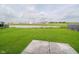 Backyard with a pond and grassy area at 2834 Wolfgang Dr, Indianapolis, IN 46239