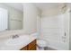Bathroom featuring a sink, toilet, and a shower-tub combination with a white shower curtain at 2834 Wolfgang Dr, Indianapolis, IN 46239