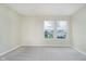 Bright bedroom featuring neutral walls, carpet, and windows offering natural light at 2834 Wolfgang Dr, Indianapolis, IN 46239