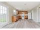 Updated kitchen boasting wood cabinets, modern appliances, and a bright and airy atmosphere at 2834 Wolfgang Dr, Indianapolis, IN 46239