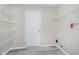 Laundry room featuring white wire shelves and a white door at 2834 Wolfgang Dr, Indianapolis, IN 46239