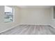 Inviting living room featuring wood-look floors and neutral walls at 2834 Wolfgang Dr, Indianapolis, IN 46239