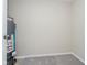 Small room featuring a water heater and carpeted floor at 2834 Wolfgang Dr, Indianapolis, IN 46239