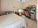 A beautifully styled bedroom with a desk, a chair, a bed and natural light creating a cozy and inviting space at 3150 Green Brook Ln, Frankfort, IN 46041