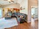 Inviting living room with vaulted ceilings, plush seating, and open floor plan at 3150 Green Brook Ln, Frankfort, IN 46041