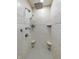Walk-in shower with white subway tile and dual showerheads; seats and shelves are a plus at 3150 Green Brook Ln, Frankfort, IN 46041