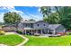 Backyard features a spacious stone patio, lush lawn, mature trees and offers room for outdoor activities at 3528 E 116Th St, Carmel, IN 46033