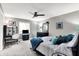 Calm bedroom features neutral tones, plush carpeting, and a dedicated work space at 3528 E 116Th St, Carmel, IN 46033