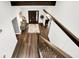 Open foyer with hardwood floors, modern console table and view of the pool table room at 3528 E 116Th St, Carmel, IN 46033