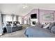 Spacious main bedroom with a sitting area, fireplace, and plush carpeting at 3528 E 116Th St, Carmel, IN 46033