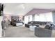 Spacious main bedroom with a sitting area, plush carpeting, and lots of natural light at 3528 E 116Th St, Carmel, IN 46033