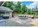 Outdoor patio with stone pavers, hot tub, seating area, and gazebo at 3528 E 116Th St, Carmel, IN 46033