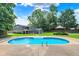Backyard with in-ground pool, gazebo, and well-manicured lawn at 3528 E 116Th St, Carmel, IN 46033