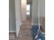 Hallway is being updated with new flooring and fresh neutral paint to make it your own at 3626 N Denny St, Indianapolis, IN 46218