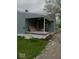 A covered porch with building materials, ready to be completed and enjoyed at 3626 N Denny St, Indianapolis, IN 46218
