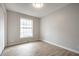 Empty bedroom with sleek flooring, and neutral paint at 3818 Fetlock Dr, Indianapolis, IN 46227